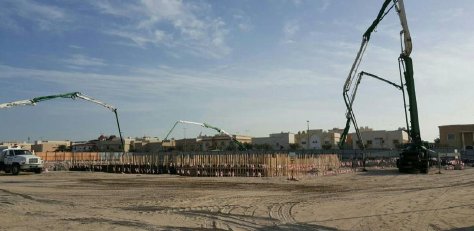 Reinforcement and formwork rising into the structural frame